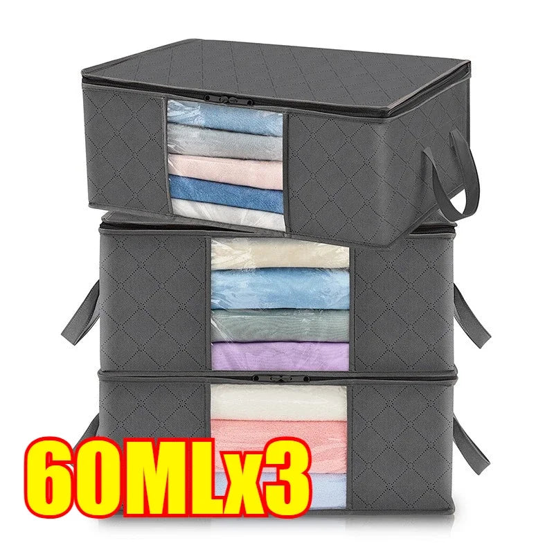 Three gray foldable storage bags filled with various colored fabrics and clothing.