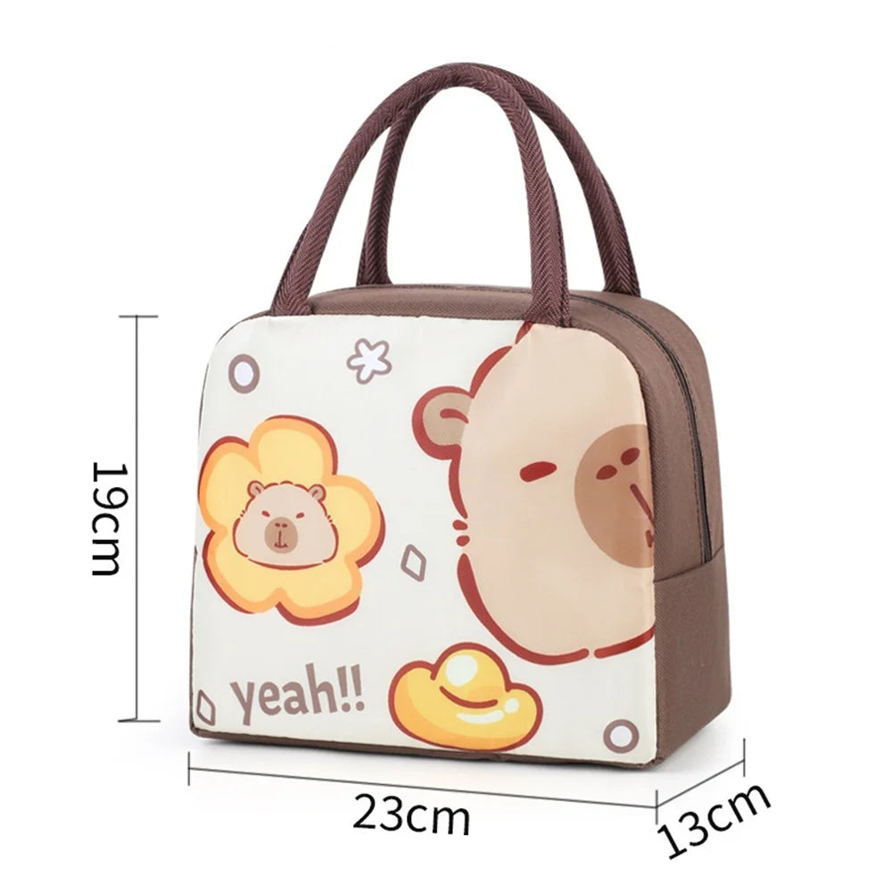 A beige and brown cartoon capybara insulated lunch bag with a handle.