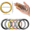 A collection of stainless steel spring clasp keychain rings in various colors and finishes.