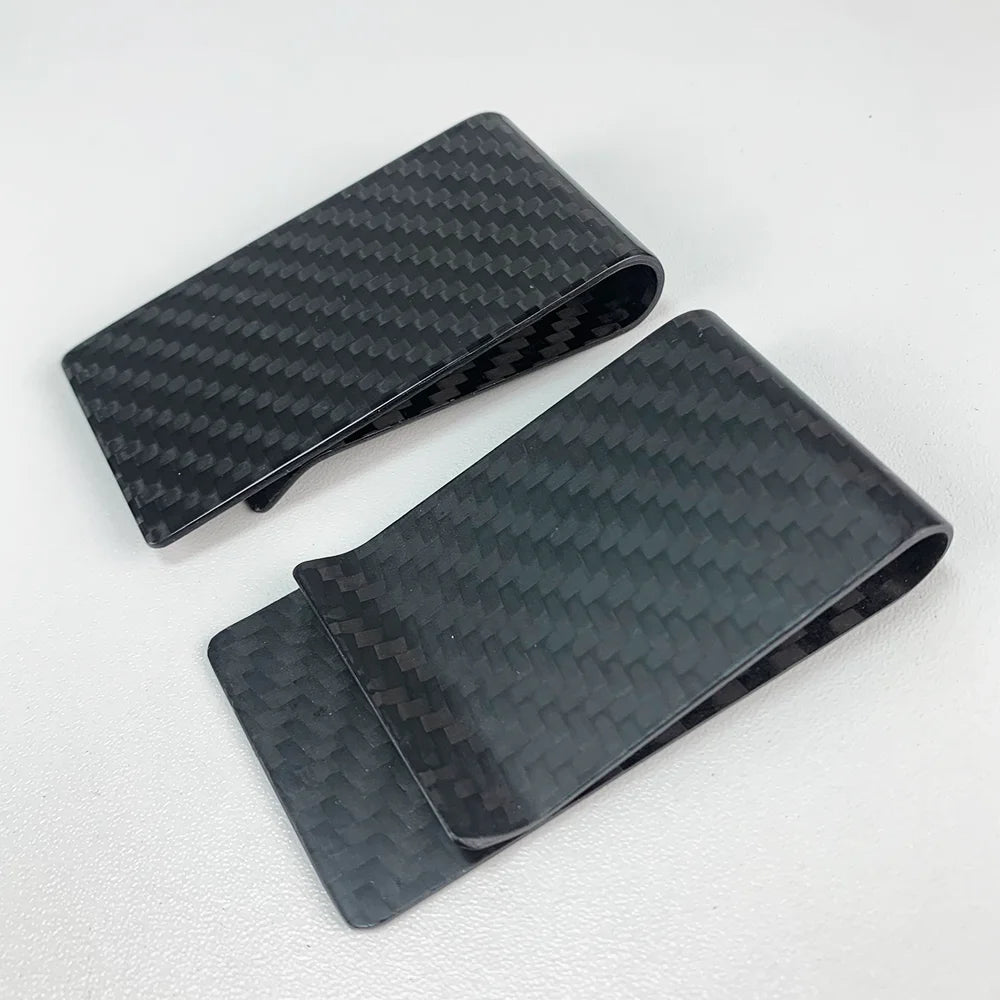 Black carbon fiber money clip with RFID protection shown from above