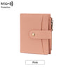 A light pink compact wallet with a flap closure and coin pouch.