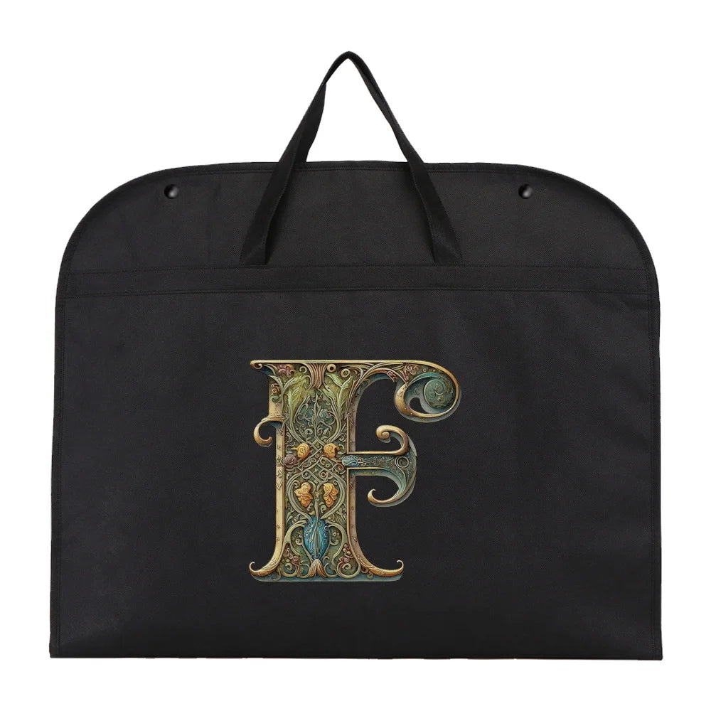 Black fabric dust cover and storage bag with a gold initial F embroidered on it.
