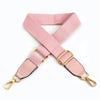Pink canvas cotton bag strap with gold metal hooks shown in an X-shape