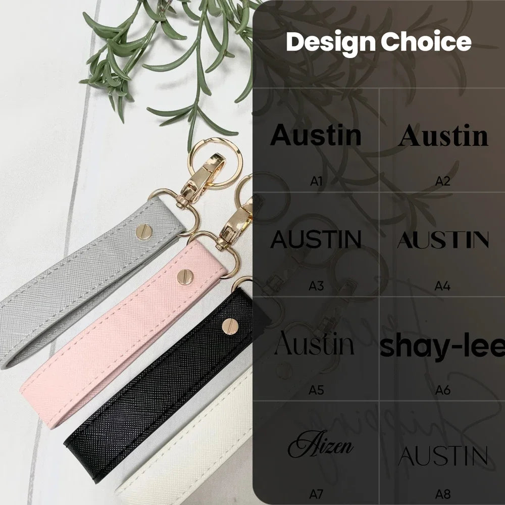 A collection of personalized leather wristlet keychains in various colors and finishes.