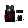 A black backpack and two black pouches featuring a red, stylized spider web design on a black background.