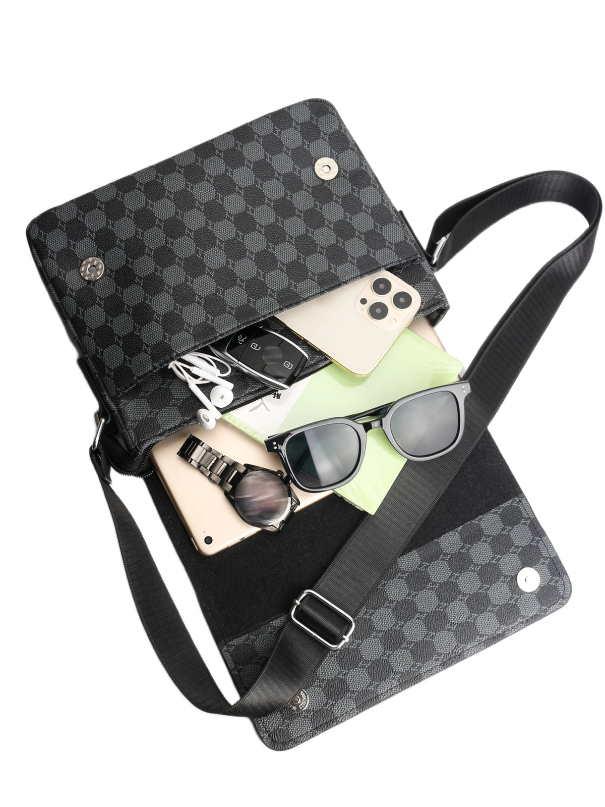 A black plaid crossbody shoulder bag with a large capacity, featuring a canvas texture and various accessories inside.
