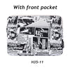A black laptop sleeve with a front pocket and various text designs on the exterior.