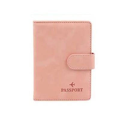 A pink leather passport organizer with a flap closure and card slots.
