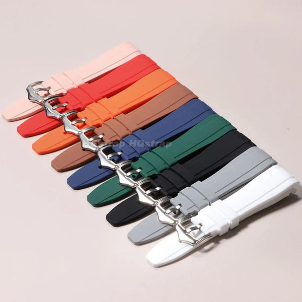 Eine Auswahl gebogener Silikonarmbänder in verschiedenen Farben werden in einer Fächerform präsentiert.