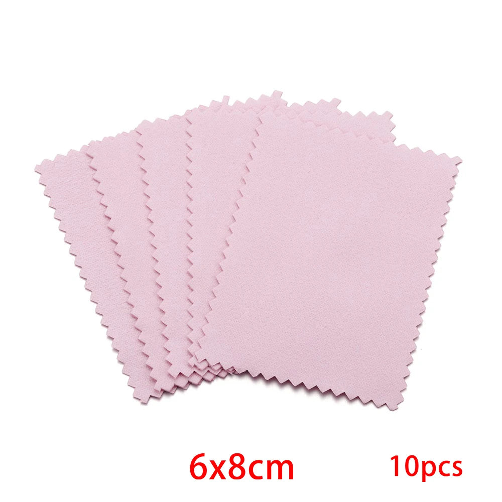 A set of ten pink polishing cloths measuring 6x8cm for silver and gold jewelry