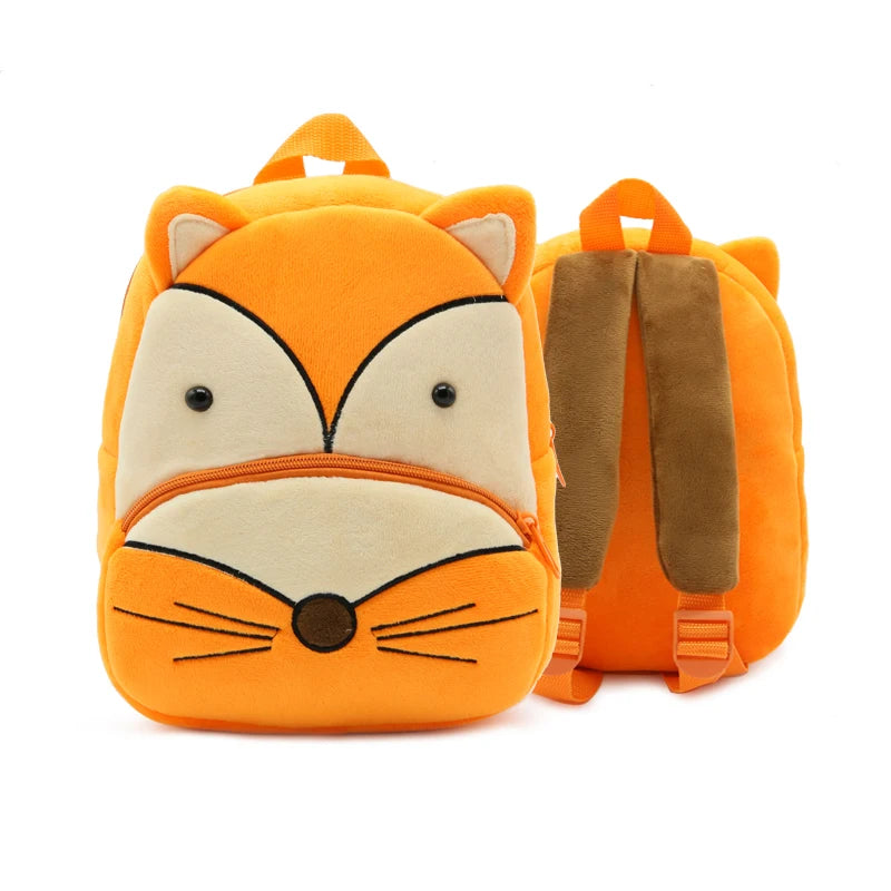 An orange cartoon fox plush backpack with tan ears and a brown strap.