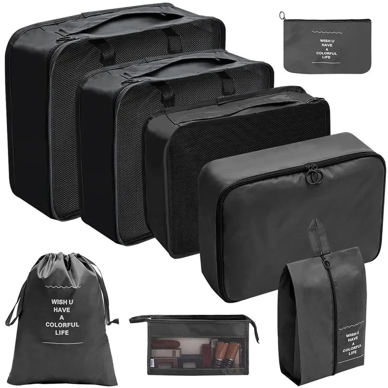 A set of black fabric storage organizers and a small pouch for keeping items.