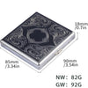 A square decorative metal cigarette storage box with intricate scrollwork designs and dimensions listed.
