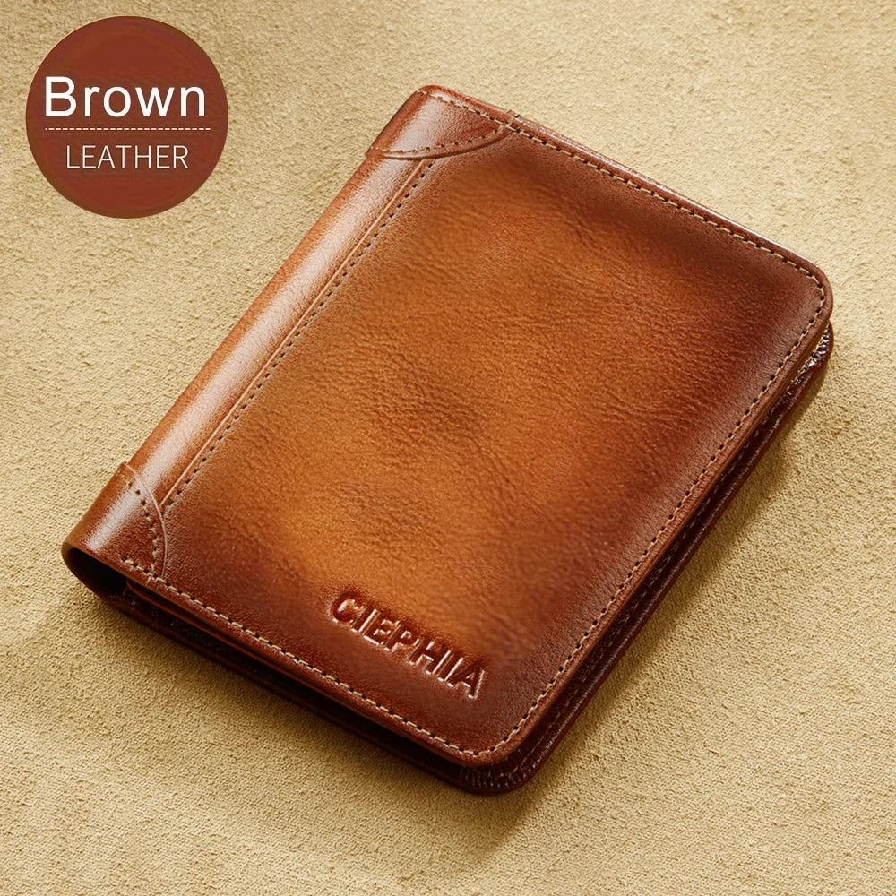 Brown leather bi-fold wallet with the name CEPHILA embossed on the cover