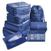 A stack of blue mesh packing cubes and a drawstring bag for travel organization.
