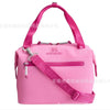 A pink Stanley insulated cooler lunch bag with a detachable crossbody strap.