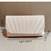A rectangular, light beige luxury chain shoulder clutch bag with vertical pleats shown on a surface.