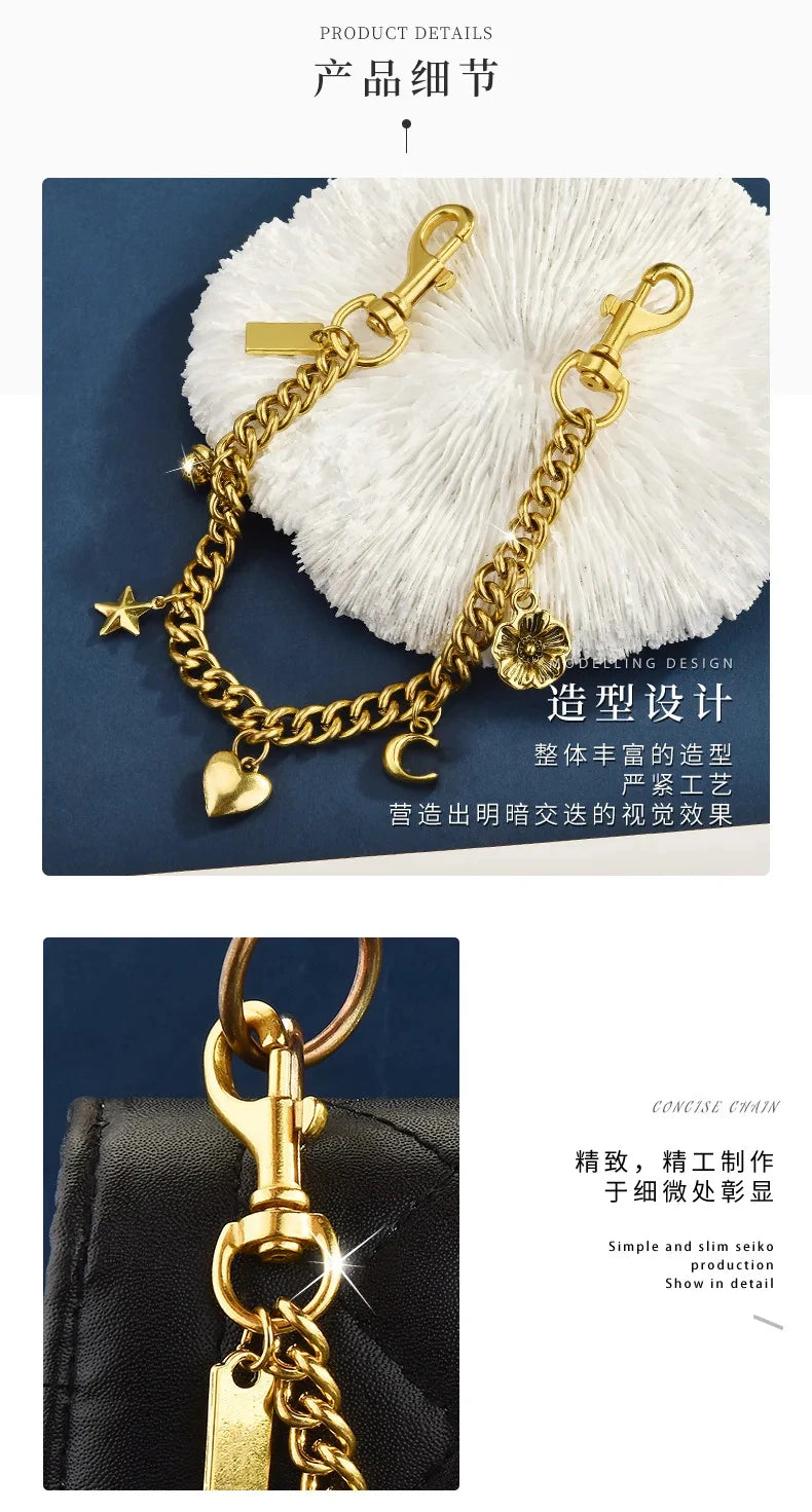 Gold chain necklace with a flower pendant displayed on a white fluffy background and next to a black bag.