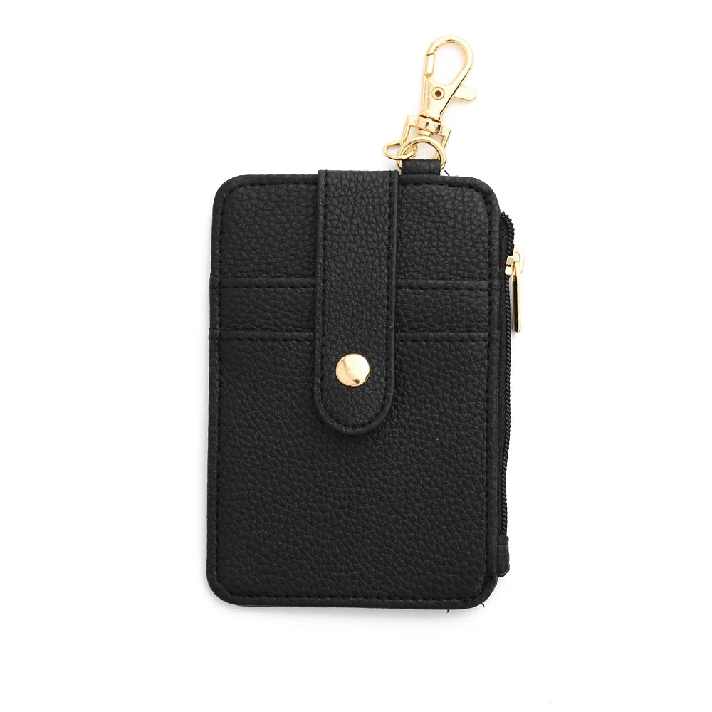 Black silicone PU leather key chain wristlet wallet with a gold-tone clasp.