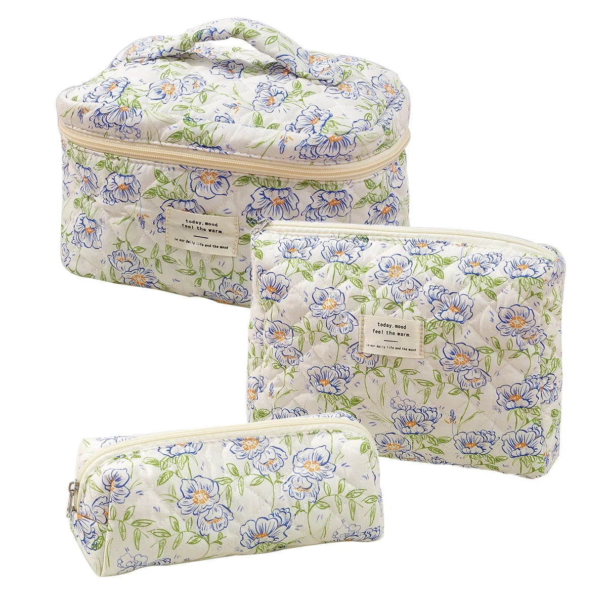 A set of quilted cotton makeup organizers featuring a light blue and green floral pattern.