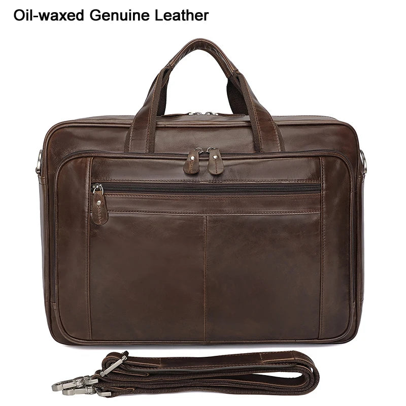 Brown oil-waxed genuine leather briefcase with a handle and attached strap.