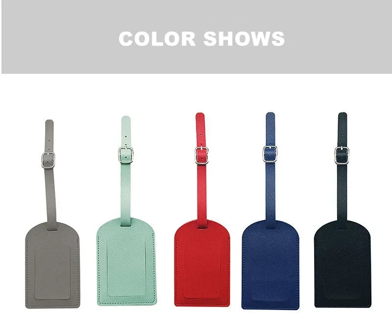 A row of five PU leather luggage tags in shades of gray, mint green, red, blue, and black.