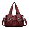 Dunkelrote Vintage Soft Kunstleder-Schultertasche mit Klappverschluss und silberner Hardware.
