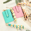 Pink and teal silicone PU leather key chain wristlet wallet with floral beaded charm
