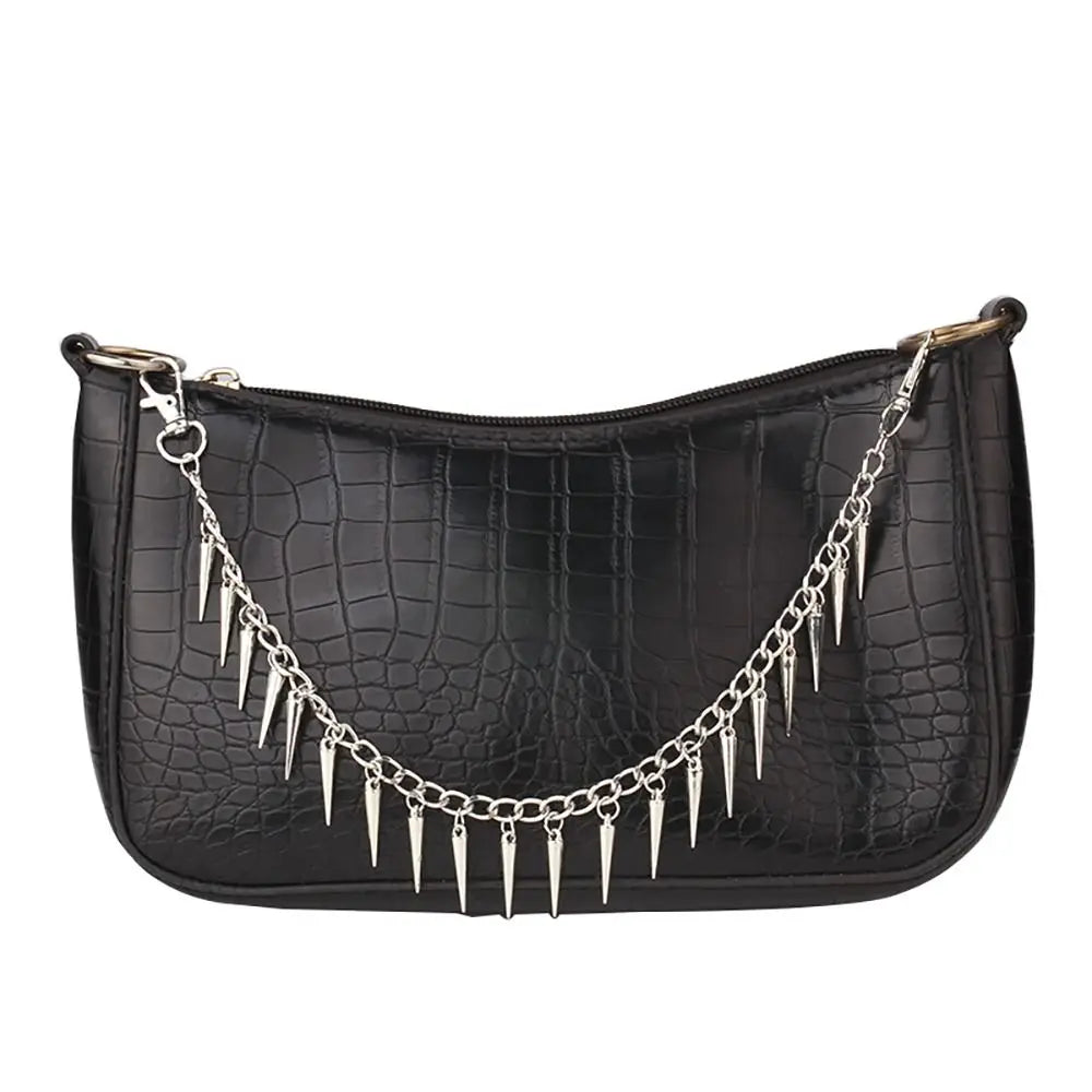 Black crocodile embossed leather purse with a silver spike chain strap