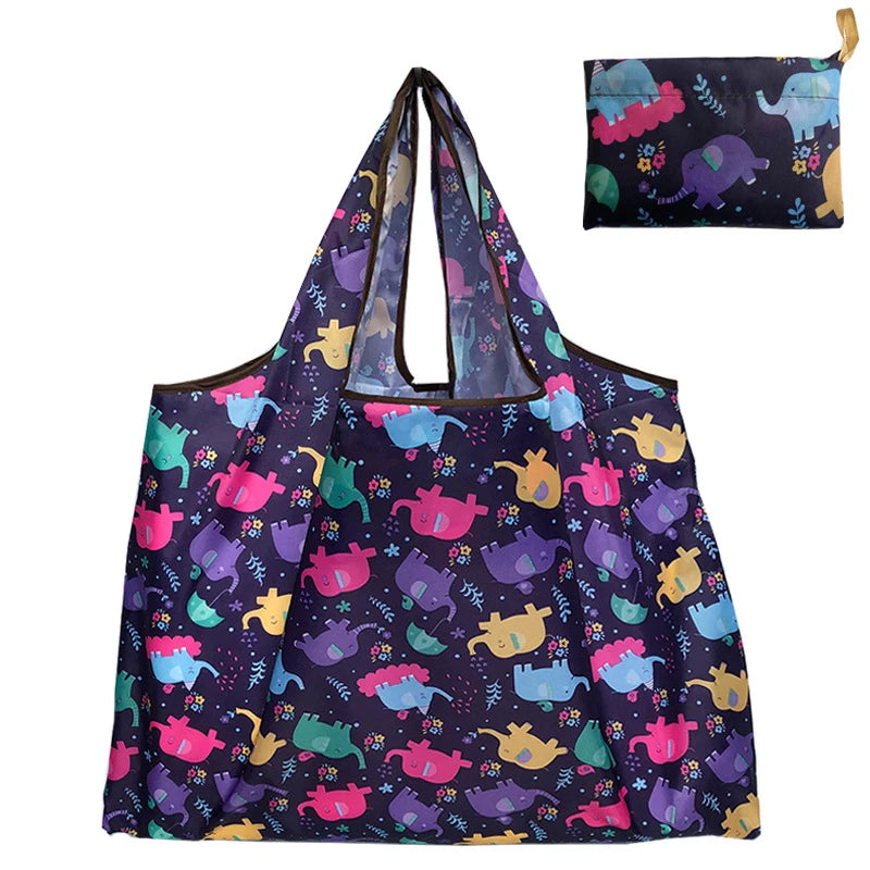 A reusable nylon tote bag featuring a dark purple background with colorful elephant and animal illustrations.