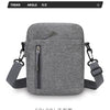 A gray lightweight nylon crossbody shoulder bag shown in a front view.