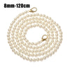 A strand of small white pearls on a gold-toned strap for a handbag or purse.
