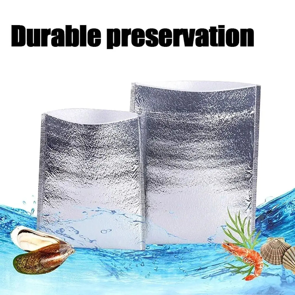 Silver insulated thermal food delivery bag with aluminum foil lining floating on blue water