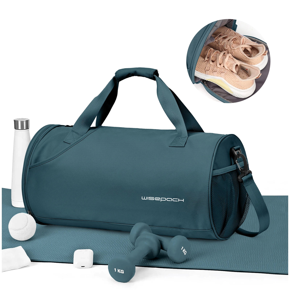A navy blue waterproof travel duffel bag with a shoe compartment and accessories lying on a light blue mat.