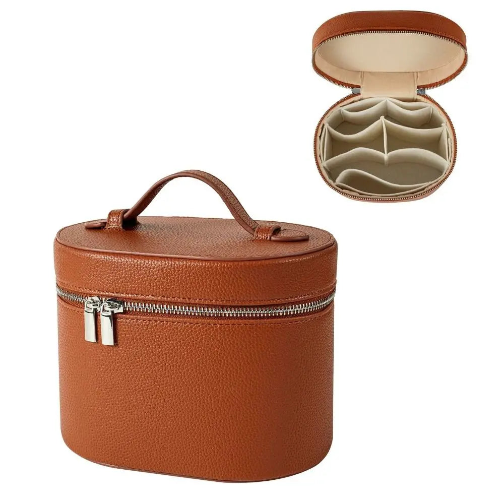 A brown leather travel makeup organizer with a zipper closure, shown closed and open.