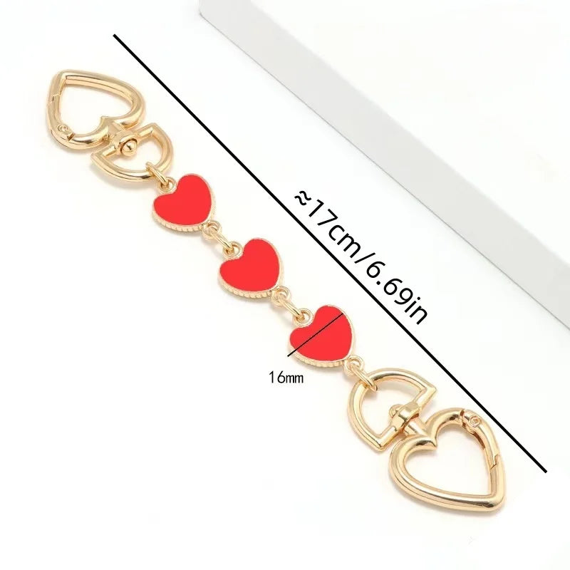 Gold alloy moon-shaped bag chain strap with clasp and heart charms