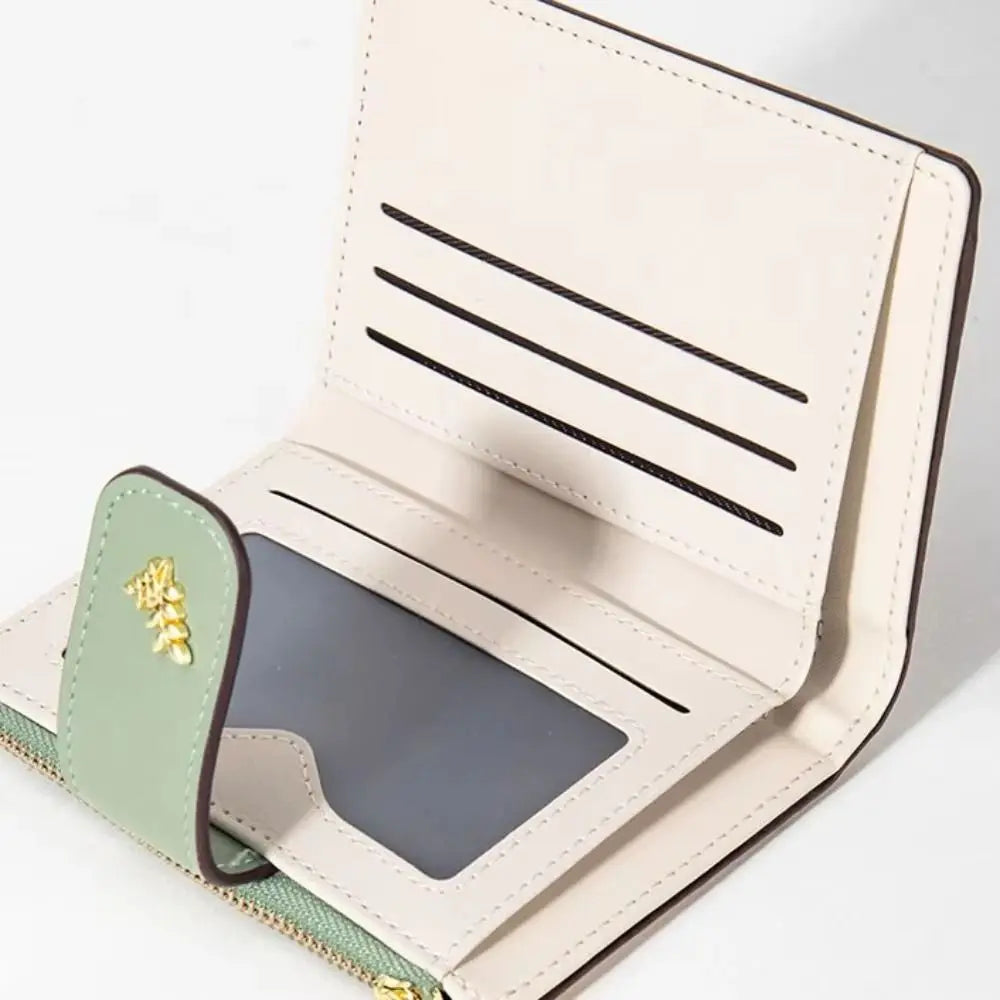 A light beige fashion PU leather slim card holder wallet with a green accent and gold hardware.