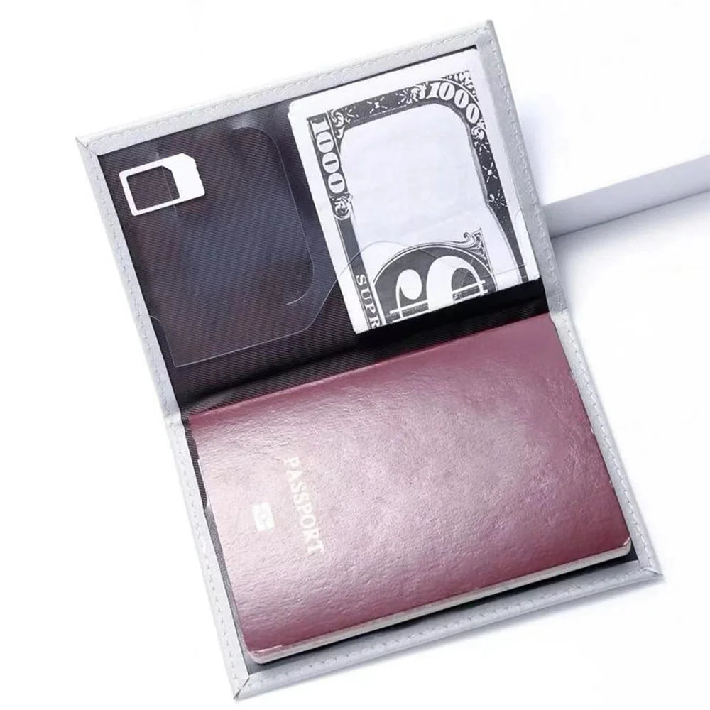 Elegant pink leather passport holder with a clear window displaying currency and a passport