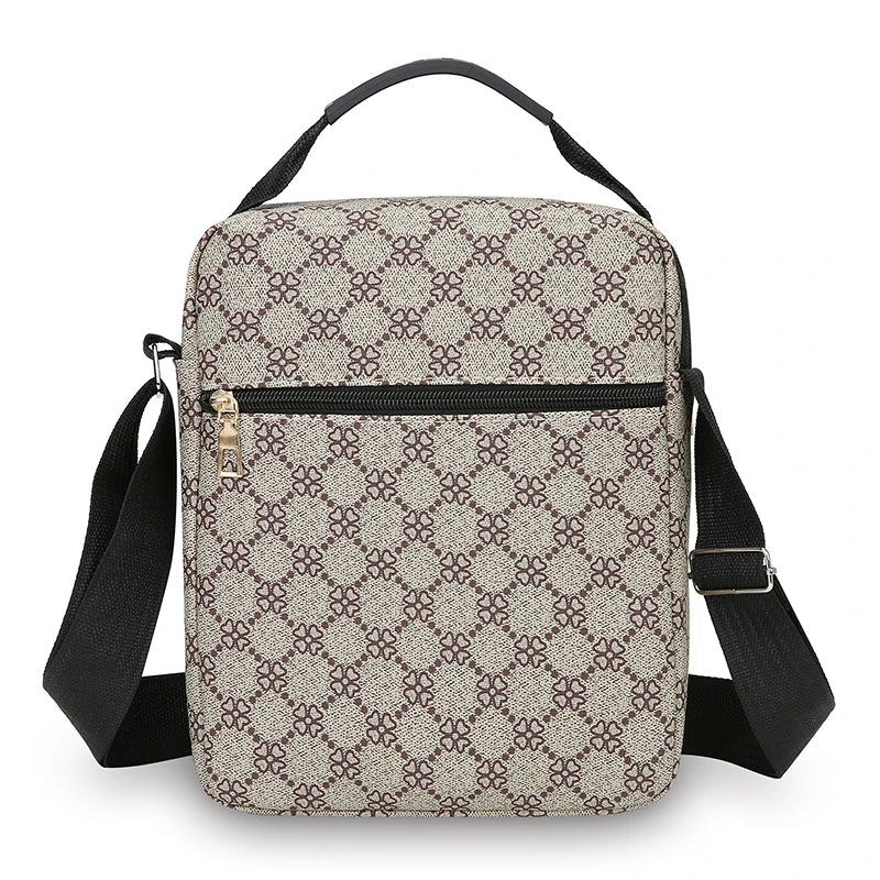 A beige and brown patterned men's crossbody sling bag with black strap.