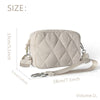 A light beige quilted nylon wristlet wallet with a silver chain and strap, shown against a white background.