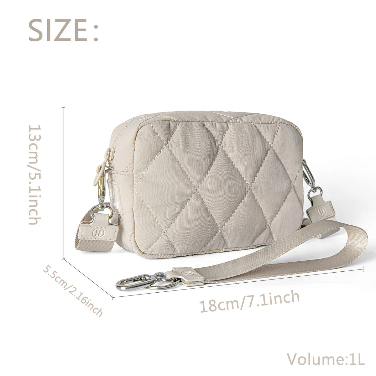 A light beige quilted nylon wristlet wallet with a silver chain and strap, shown against a white background.