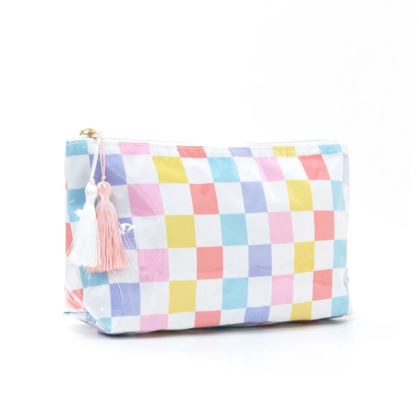 A colorful patchwork cosmetic storage pouch featuring pink, yellow, blue, and white squares with tassels.
