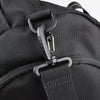 Black adjustable nylon shoulder strap attached to a black bag or briefcase.