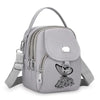Sac bandoulière floral gris clair et durable avec fermeture éclair et sangle réglable.