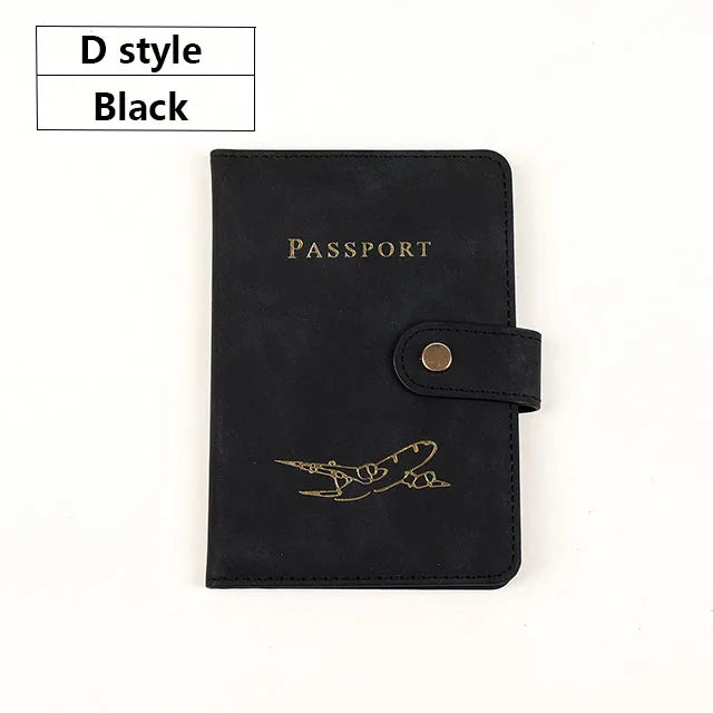 Black D style passport cover with gold embossed airplane design