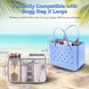 A blue mesh organizer insert is shown next to a large blue Bagg X bag, demonstrating compatibility for organizing items.