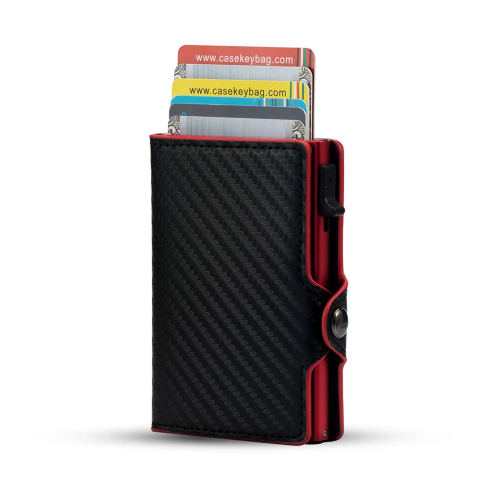 A black carbon fiber RFID pop-up card holder with a red accent.