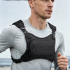 A man wearing a black lightweight running chest pack while exercising outdoors.
