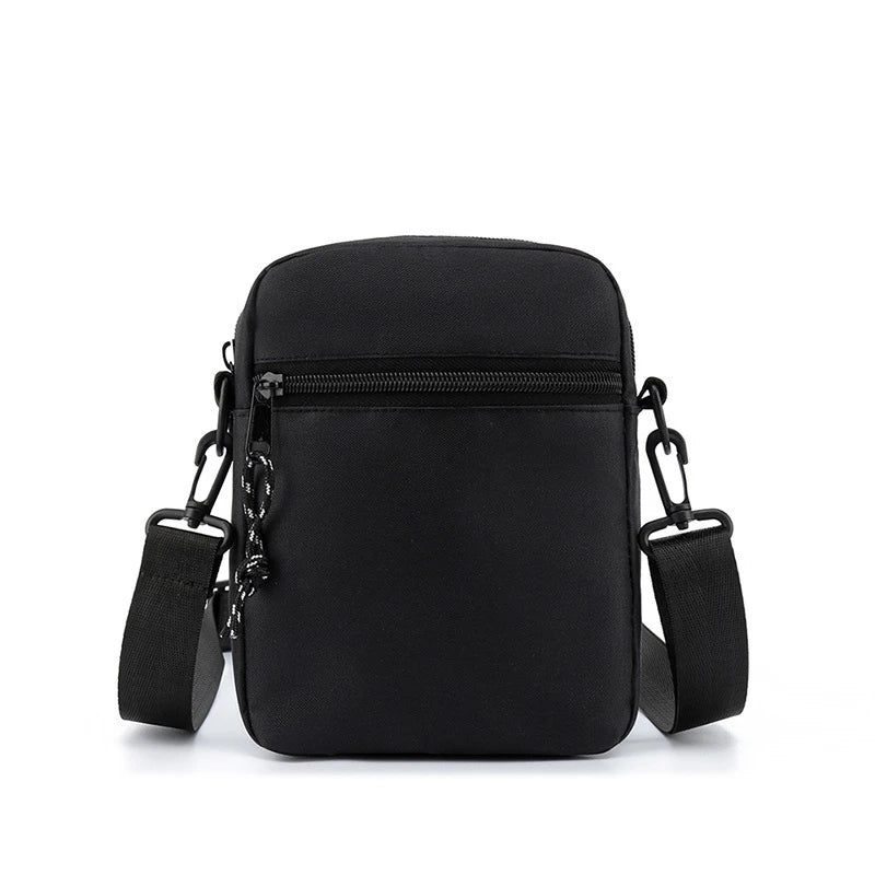 Black minimalist nylon crossbody bag with adjustable straps
