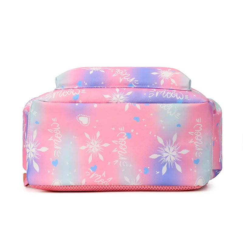 A pink and purple multi-compartment backpack set with floral patterns.